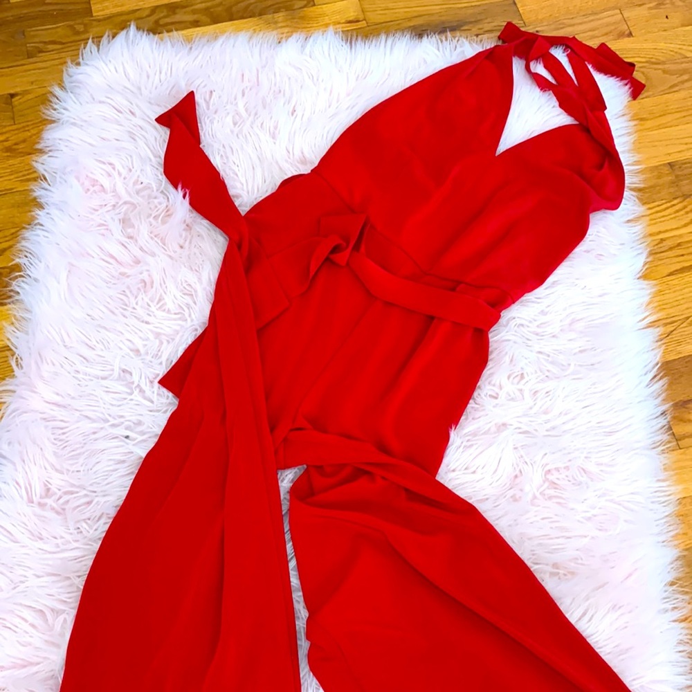 Red jumpsuit size 4, wide legged with sash at waist. Halter style top